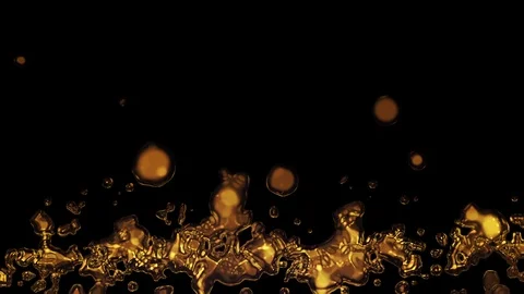 Liquid Gold on Black Background. Loop Stock Footage 114292125