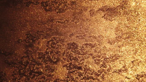 Liquid gold flowing in smooth waves, creating a beautiful abstract metallic Stock Footage 311061392