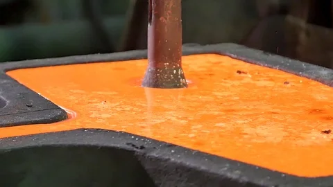 Liquid gold in the form Stock Footage 77938220