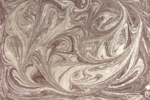 Liquid gold marbled pattern. Beige background Stock Photos