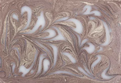 Liquid gold marbled pattern. Beige background Stock Photos