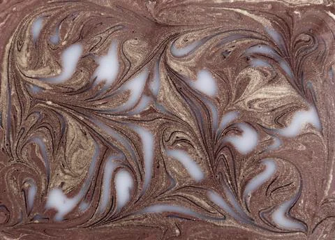 Liquid gold marbled pattern. Beige background Stock Photos