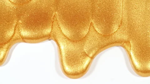 Liquid Gold Motion On The White Background. Macro Shot of Glitter Fluid Metallic Stock Footage 272598167