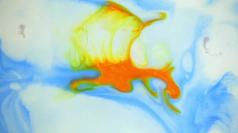 Liquid ink two colors yellow and blue blending burst swirl fluid Vídeos de archivo 68093639