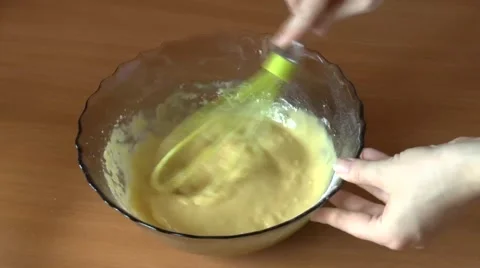 Liquid kneading dough Stock Footage 49394719