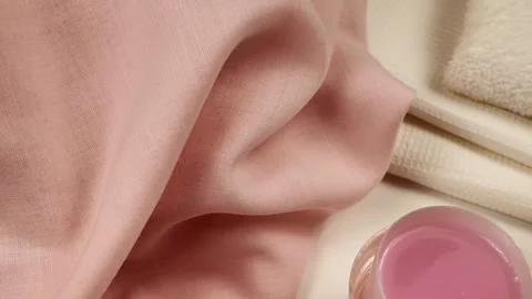 Liquid laundry detergent in a measuring container Stock Footage 301122173