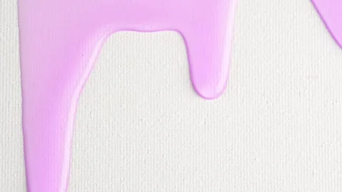 Liquid light purple drops of cosmetics product with bubbles flowing on the .. Stock Footage 250517060