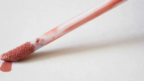 Liquid lipstick on white background, red liquid lipstick with a single color  Stock Footage 162377931