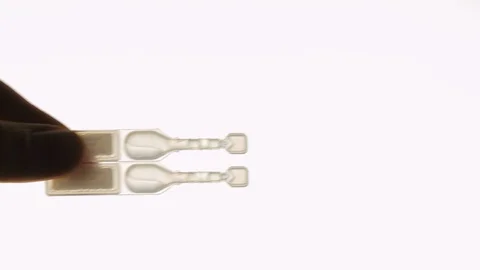 Liquid Medical Sample in Tiny Plastic Pouch Stock Footage 124210089