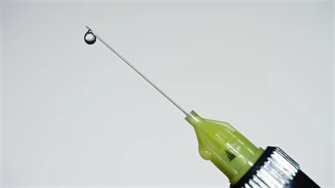 Liquid Medication Emerging From Medical Needle Stock Footage 343315420