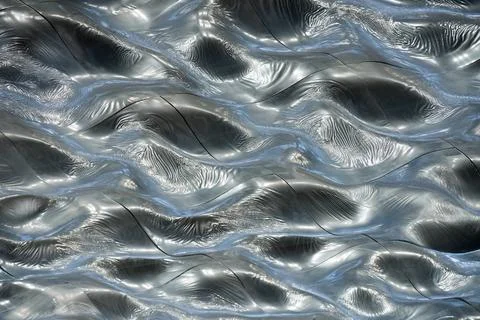 Liquid metal background texture ceiling silver roof 写真素材
