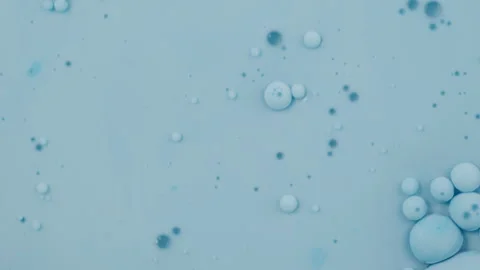 Liquid movement, Abstract background, Water, Oil, Pale Blue Dye. Macro Video Stock Footage 304791015