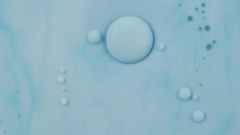Liquid movement, Abstract background, Water, Oil, Pale Blue Dye. Macro Video Stock Footage 304791126