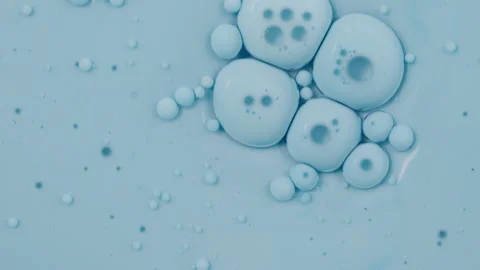 Liquid movement, Abstract background, Water, Oil, Pale Blue Dye. Macro Video Stock Footage 304791614
