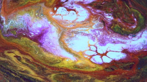 Liquid multi-colored mixed pearlescent paints slowly flow. Abstract multicolored Vidéo 141982101