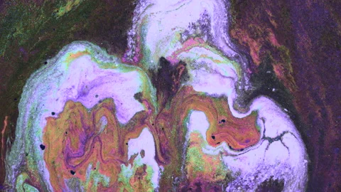 Liquid multi-colored mixed pearlescent paints slowly flow. Abstract multicolored Stock Footage 141982750