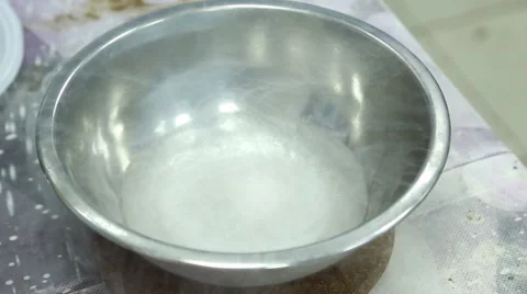 Liquid nitrogen boils in the bowl Stock Footage 64455192