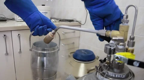 Liquid nitrogen is placed in medical cryogenic tanks Stock Footage 40107255