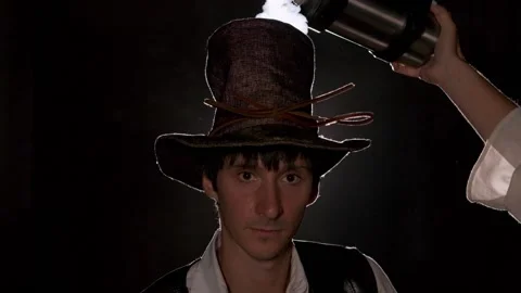 Liquid nitrogen is poured onto the alchemist's hat. A lot of steam is spreading 스톡 동영상 168261125