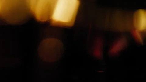 Liquid orange light leak effect on a black background Stock Footage 345517708