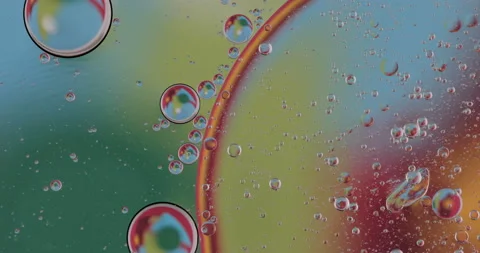 Liquid paint mixing artwork with splash and swirl Video stock 151350690