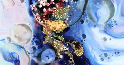 Liquid paint mixing artwork with splash and swirl Stock Footage 151566987