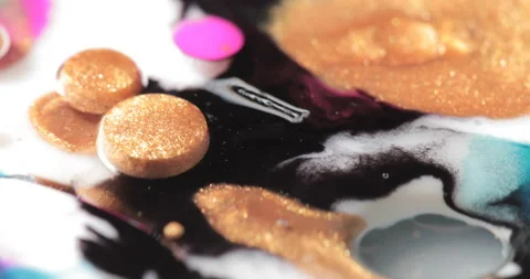 Liquid paint mixing artwork with splash and swirl Stock Footage 153294534