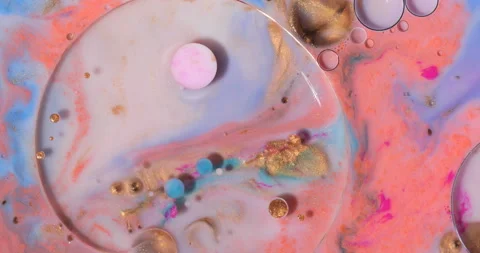 Liquid paint mixing artwork with splash and swirl Stock Footage 153294642