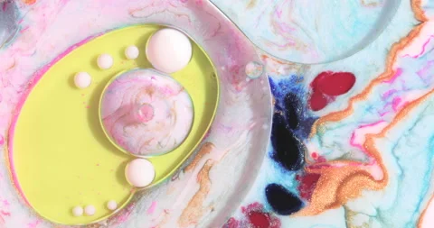 Liquid paint mixing artwork with splash and swirl Stock Footage 153296565