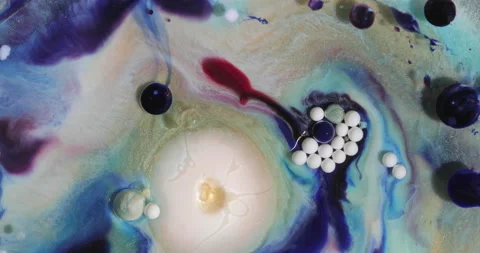 Liquid paint mixing artwork with splash and swirl Stock Footage 153952759