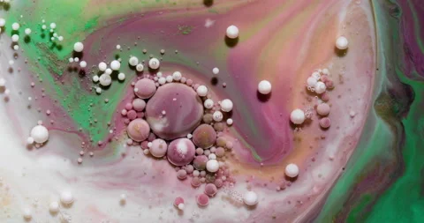 Liquid paint mixing artwork with splash and swirl Stock Footage 153953616