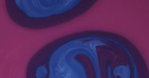 Liquid paint mixing artwork with splash and swirl Stock Footage 153955642