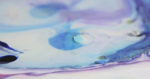 Liquid paint mixing artwork with splash and swirl Stock-Footage 154735646