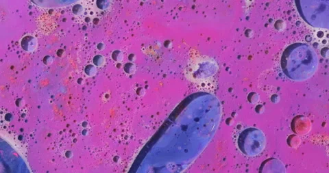 Liquid paint mixing artwork with splash and swirl Stock Footage 156833694