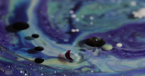 Liquid paint mixing artwork with splash and swirl Stock Footage 158806644