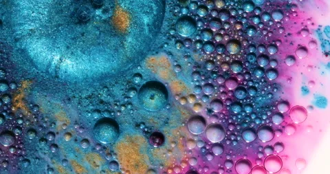 Liquid paint mixing artwork with splash and swirl Stock Footage 158807535