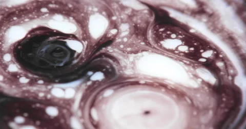 Liquid paint mixing artwork with splash and swirl Stock Footage 159030330