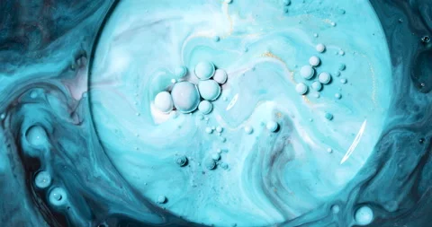 Liquid paint mixing artwork with splash and swirl Stock Footage 159032410