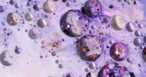 Liquid paint mixing artwork with splash and swirl Stock Footage 159034219