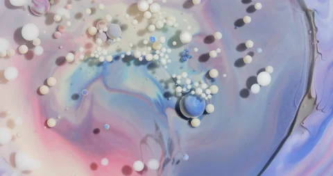 Liquid paint mixing artwork with splash and swirl Stock Footage 162274188