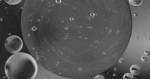 Liquid paint mixing artwork with splash and swirl Stock Footage 162765153