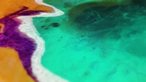 Liquid paint mixing artwork with splash and swirl Stock Footage 165140323