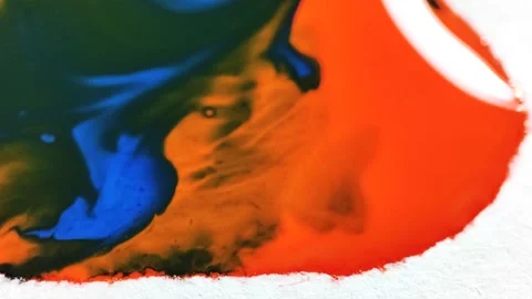 Liquid paint mixing artwork with splash and swirl Stock Footage 165142009