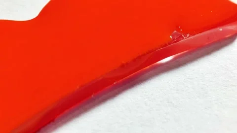 Liquid paint mixing artwork with splash and swirl Video stock 165143034