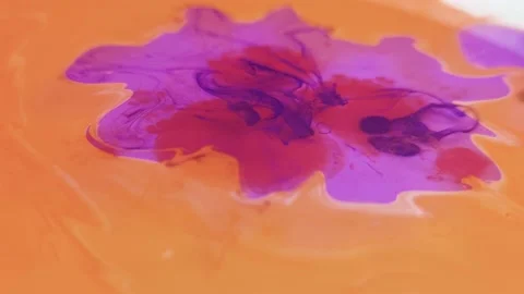 Liquid paint mixing artwork with splash and swirl Stock Footage 165143700
