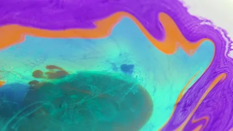 Liquid paint mixing artwork with splash and swirl Stock Footage 165146073