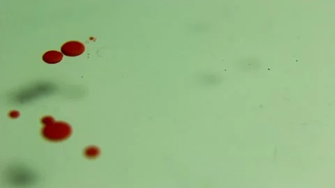 Liquid paint mixing artwork with splash and swirl Stock Footage 165147772