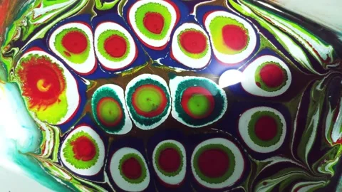 Liquid paint mixing artwork with splash and swirl Stock Footage 165163373