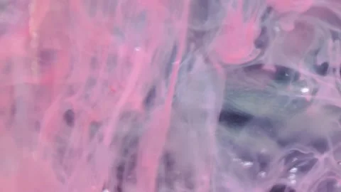 Liquid paint mixing artwork with splash and swirl Stock Footage 165164329