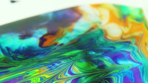 Liquid paint mixing artwork with splash and swirl Stock Footage 165164636